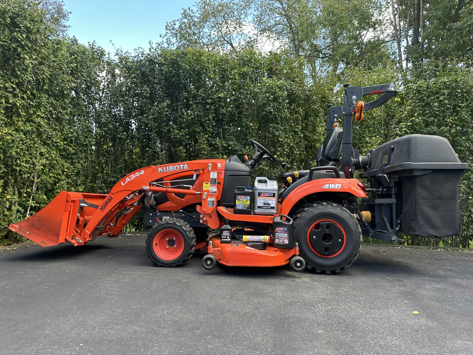 My 2019 BX2680 compact tractor with loader and AMSOIL fluids on the deck